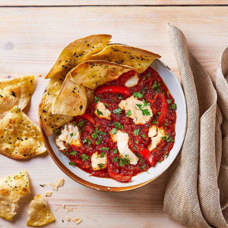 TapasStyle Haddock Stew With Garlic Flatbreads Recipe Gousto