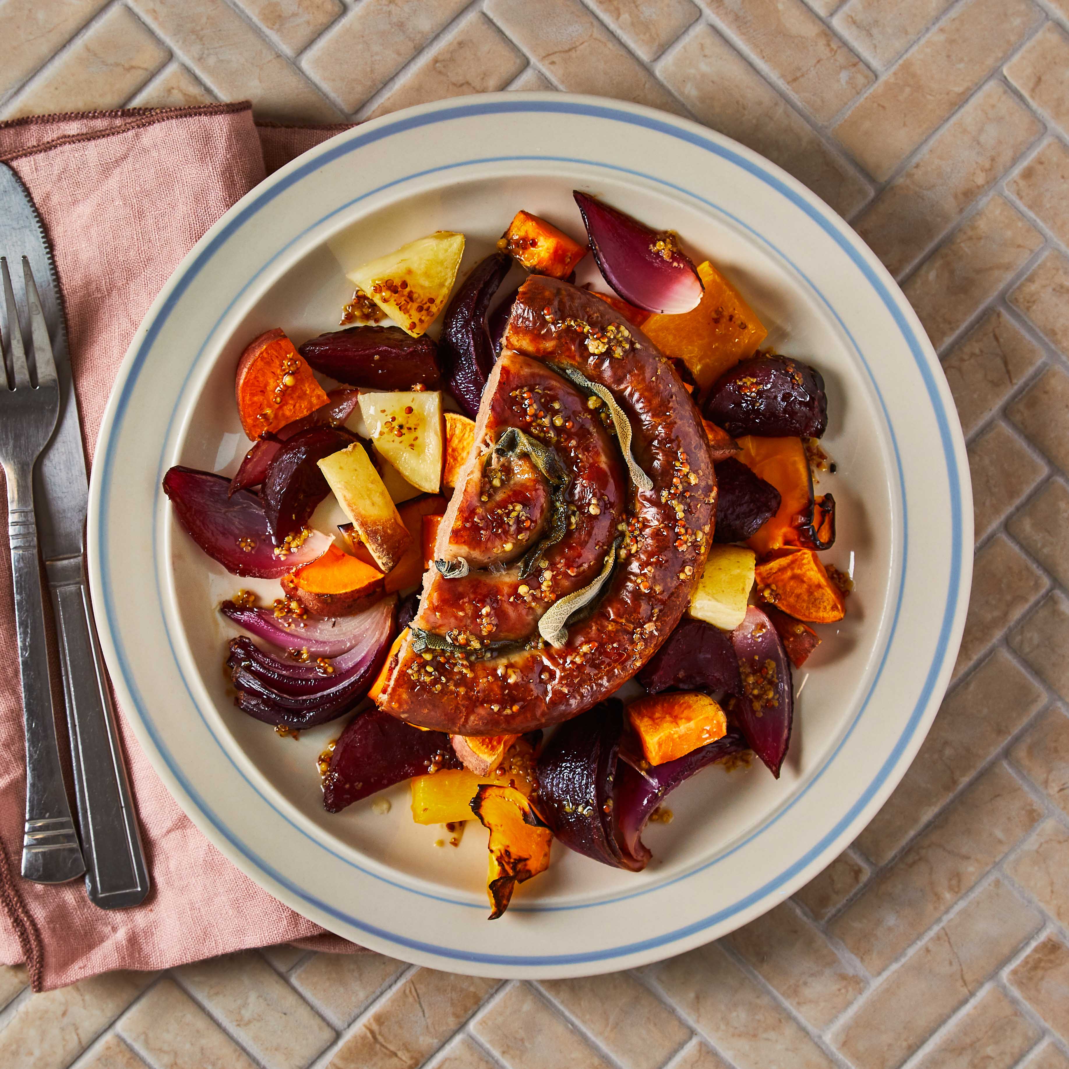 Catherine Wheel Sausage & Beetroot Tray Bake Recipe Gousto