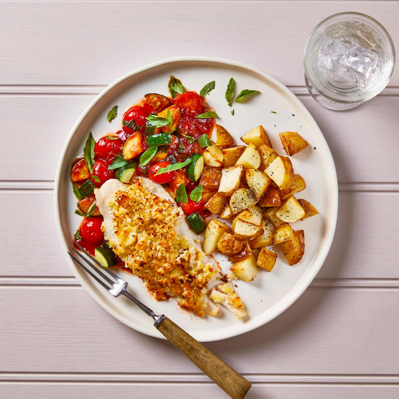 Cheesy Baked Fish With Mediterranean Vegetables Recipe Gousto