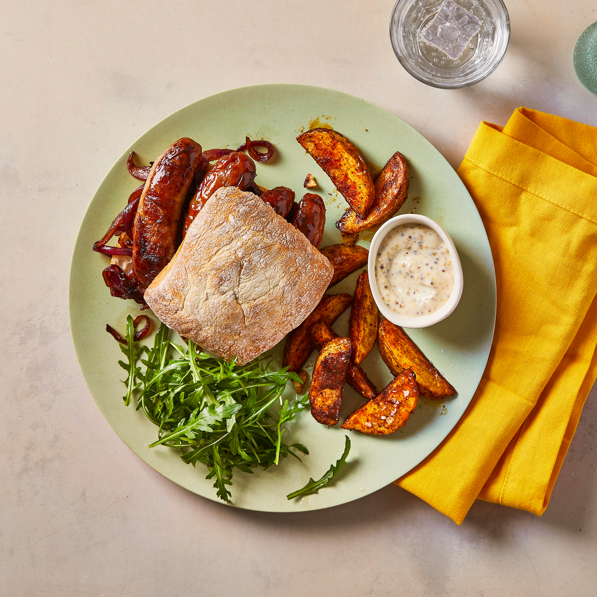 Sausage & Mustard Sarnie With Chips & Rocket Recipe Gousto