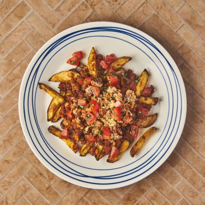 Lean Bolognese Loaded Fries With Balsamic Tomato & Basil Salad
